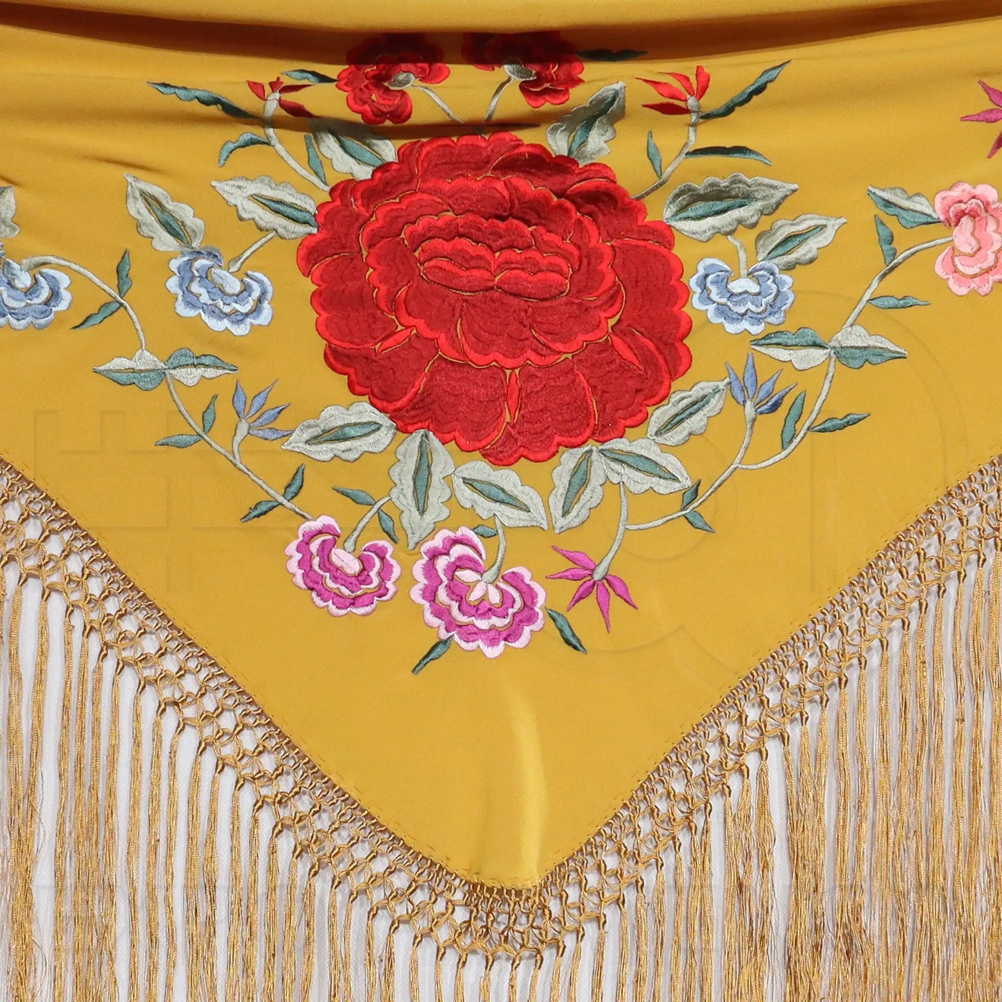Mantoncillos bordados